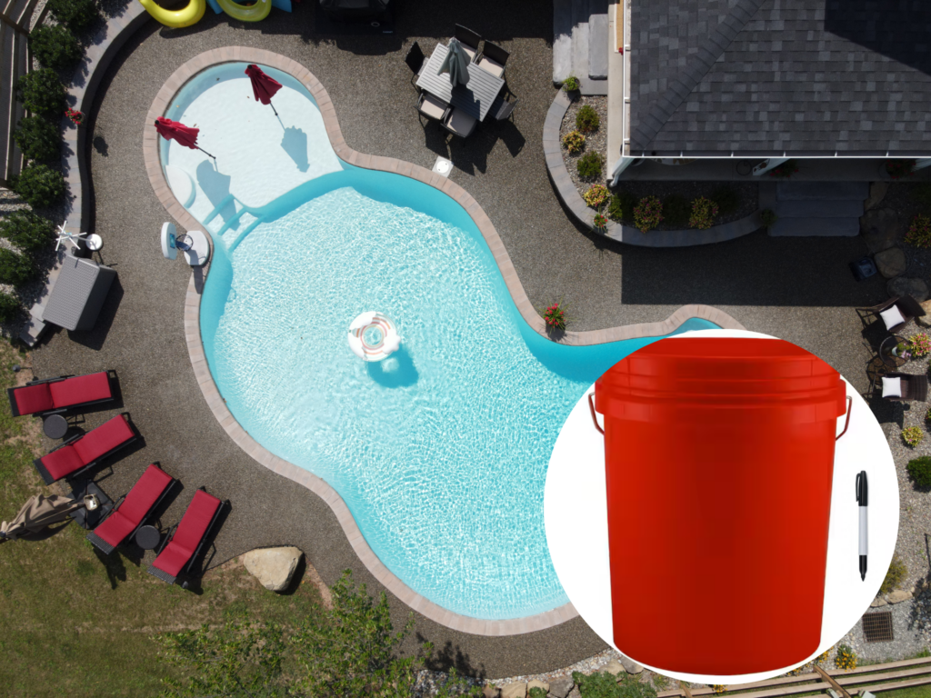 bucket and marker next to a pool